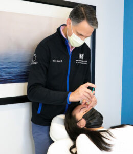 Dr. Bruno injecting Botox